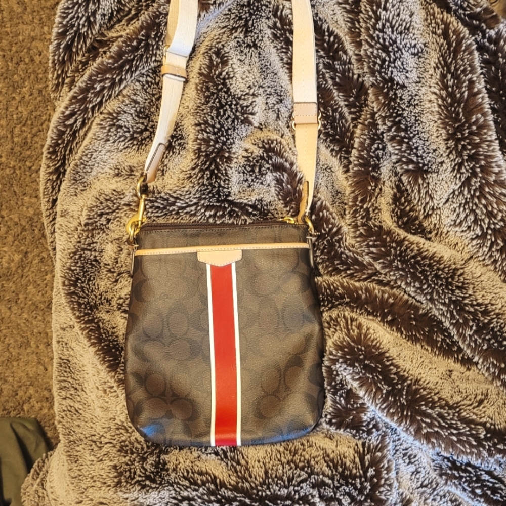 Coach crossbody purse, brown with dark pink stripe